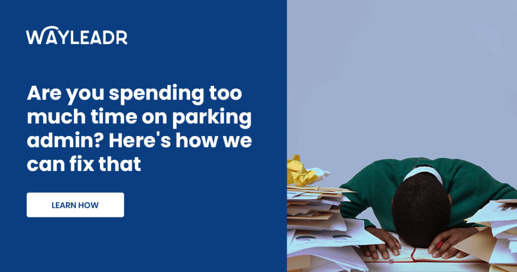 A person rests their head on a desk cluttered with documents, next to text that reads, "Are you spending too much time on parking lot management? Here's how we can fix that." and a "LEARN HOW" button.