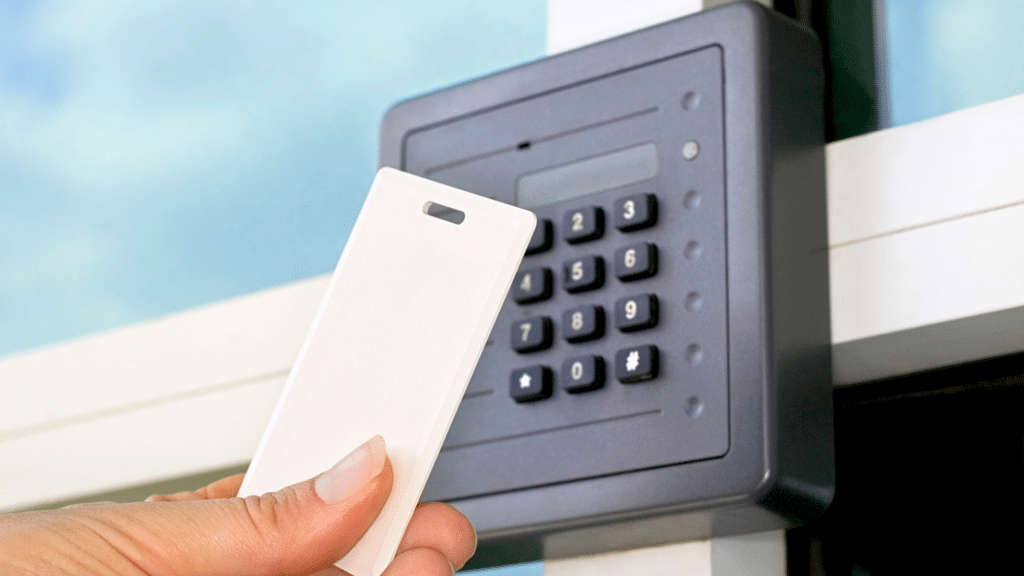 A hand holding a key card, essential for smooth parking management.