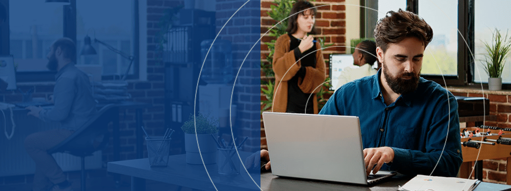 A bearded man works on a laptop at a desk in a modern office, possibly focusing on parking lot management. In the background, a woman and another man converse near a window. The left side of the image is overlaid with a semi-transparent blue tint.