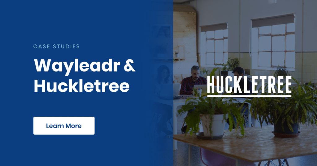 Promotional image for Wayleadr and Huckletree case studies featuring text "Wayleadr & Huckletree" and "Learn more." The background shows a modern office space with people working, plants on tables, and a glimpse of parking management solutions in action.