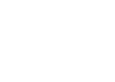 White logo with the words "Tourism Fernie" in stylized text, including a maple leaf graphic above the letter "I.