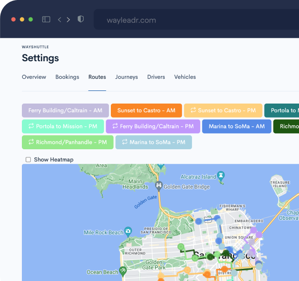 A computer screen shows a web page with various colored route buttons above a map of San Francisco, used for planning shuttle routes.